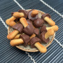 Meiji Kinoko no Yama Chokolade Kiks - Små kiks fra japanske Meiji formet som nuttede svampe med et lækkert mælkechokoladeovertræk.