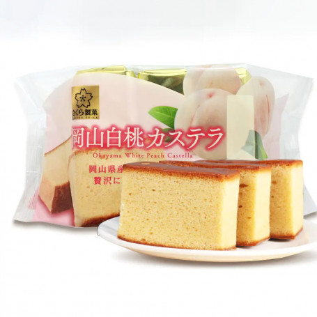 Sakura Seika Okayama White Peach Castella Kage - Aromatisk, indbydende japansk Castella kage med smag af hvide ferskner fra Okayama. En blød, svampet og fugtig kage med lækker smag.